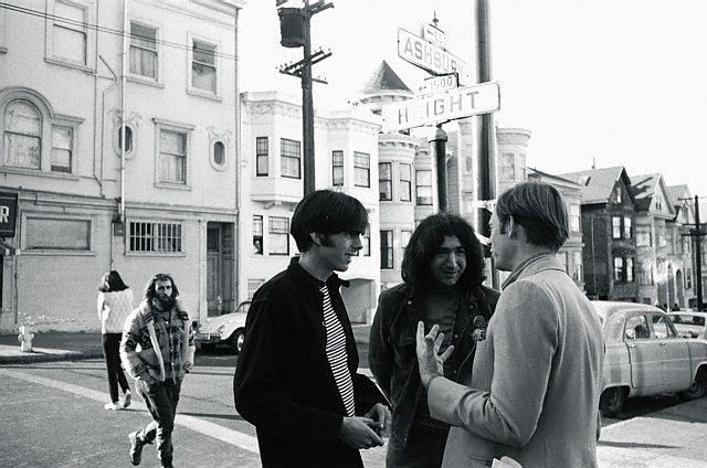 Scully, Garcia, and Wolfe Talking on the Sidewalk
